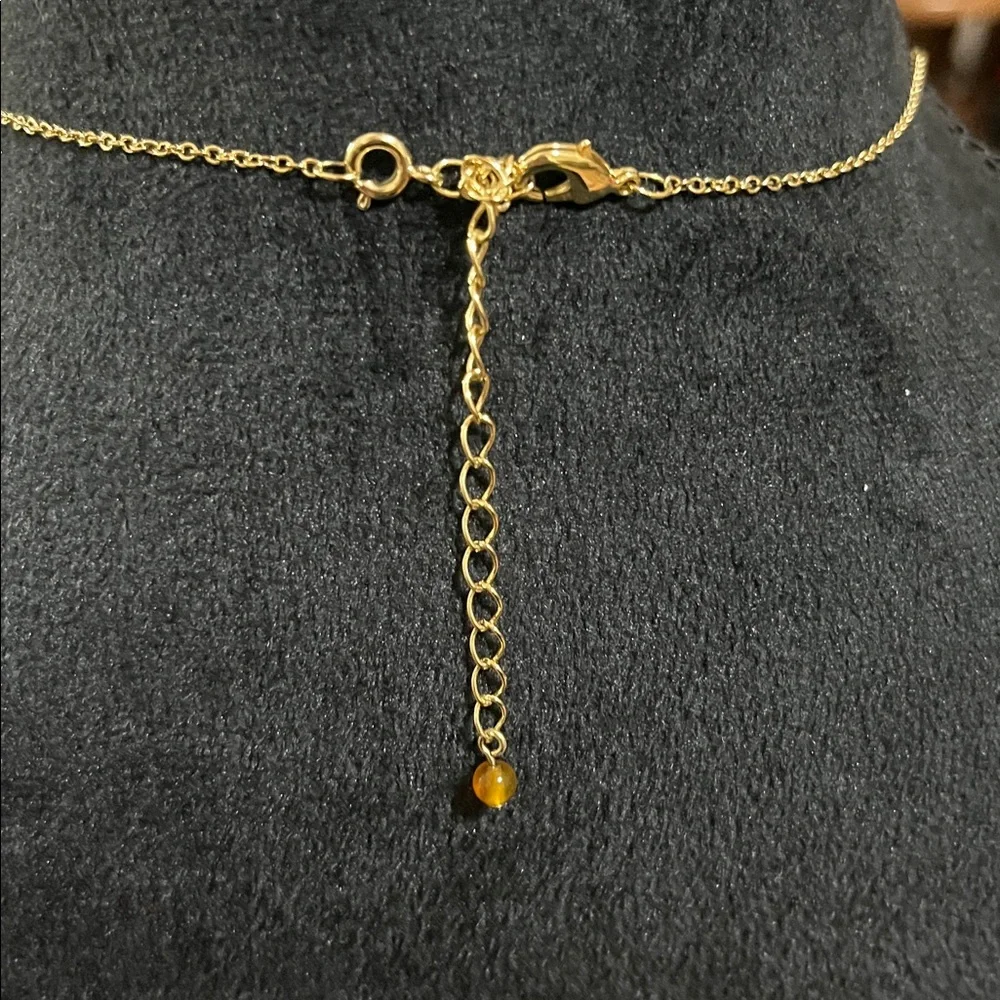 Avon gold tone purple/pink necklace, selected by Paula Abdul